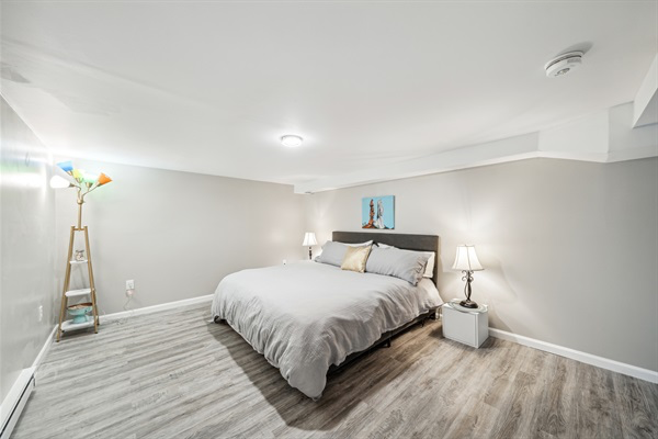 The spacious front bedroom with king bed, with accessible height.