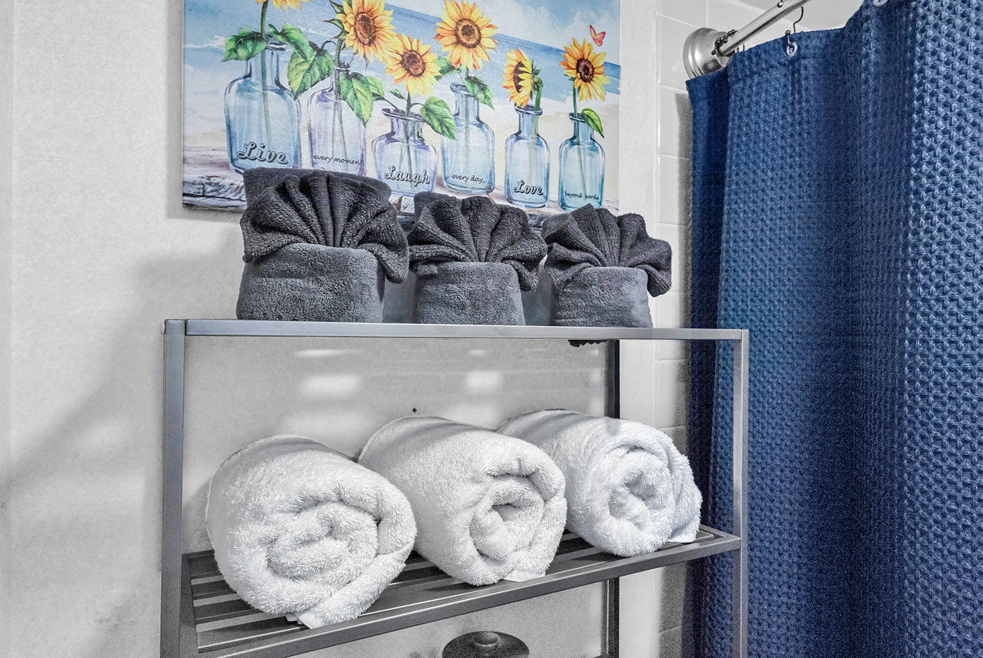Fresh towels provided — bathroom stocked for a comfortable stay