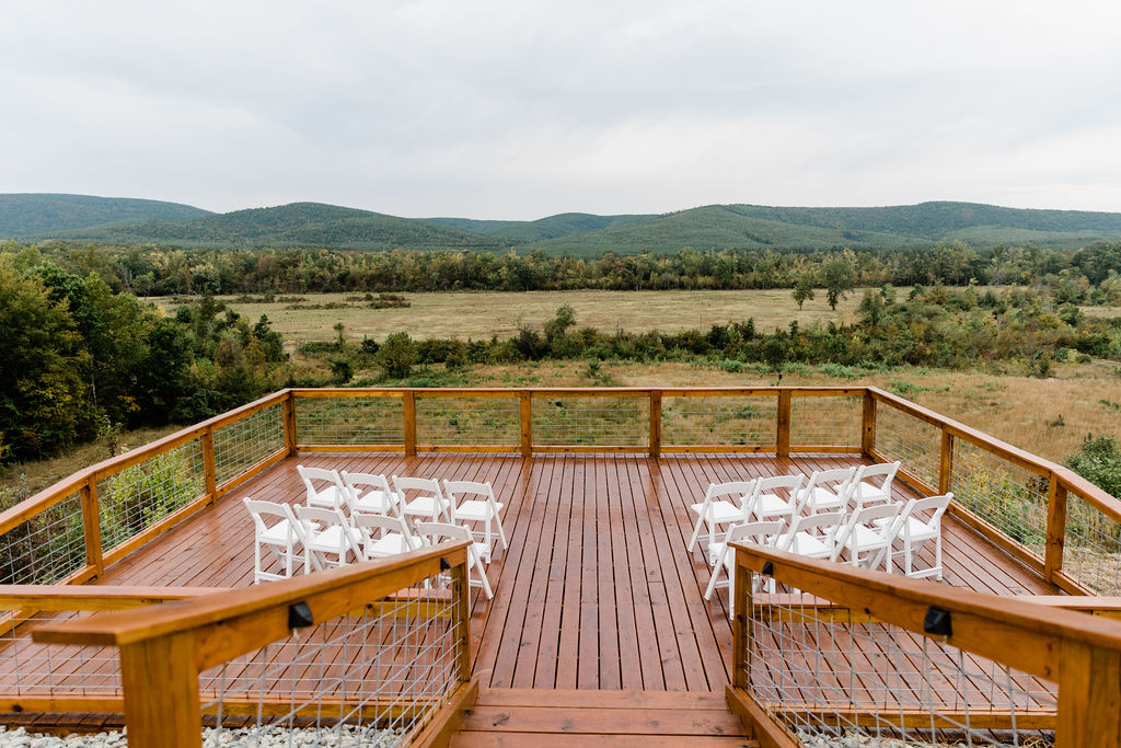 Deck reception space with open mountain views.