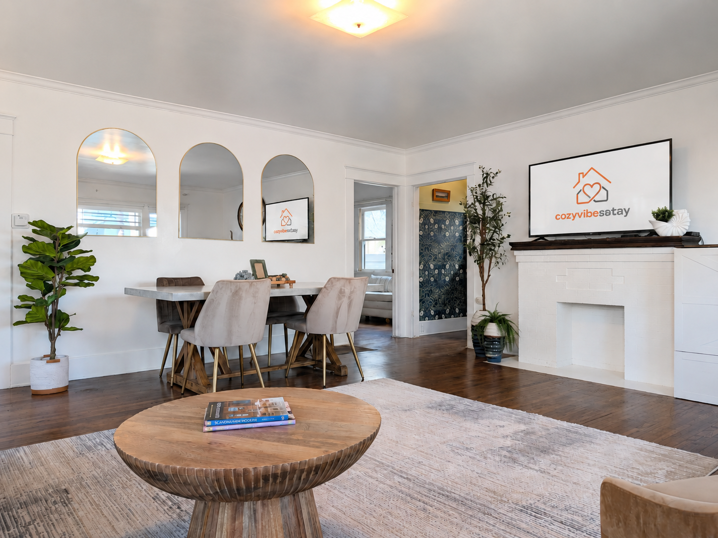 Open-concept living and dining area with TV, comfortable seating and spending time together.