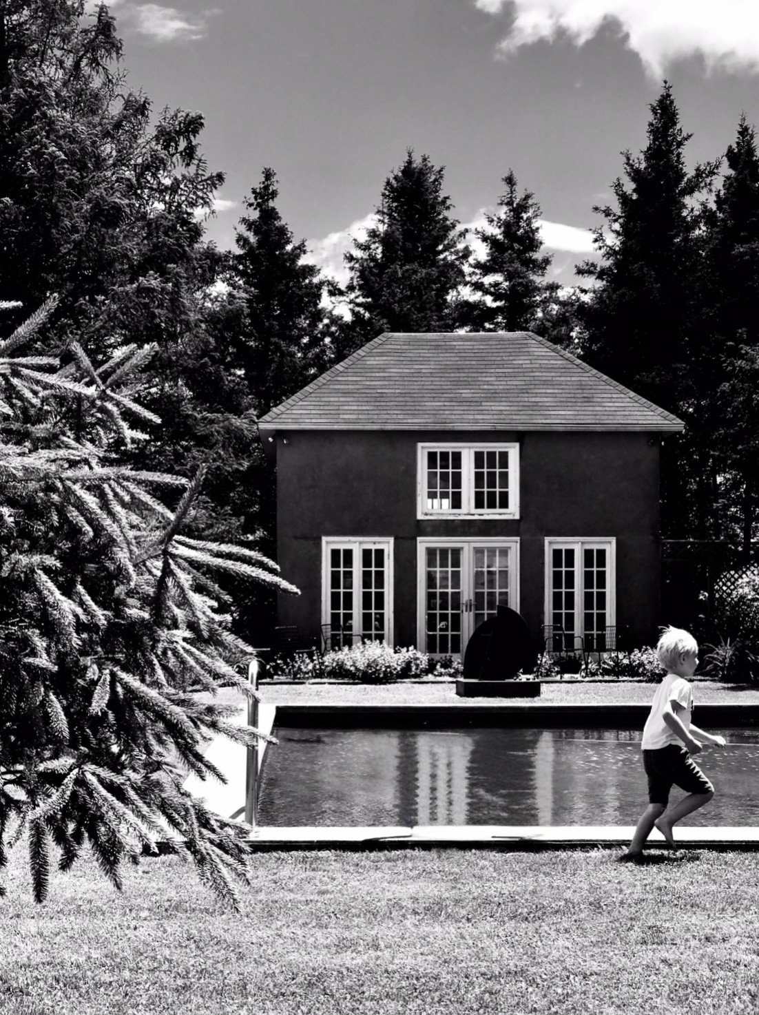 Hawk Field Pool House a child enjoying the grounds.