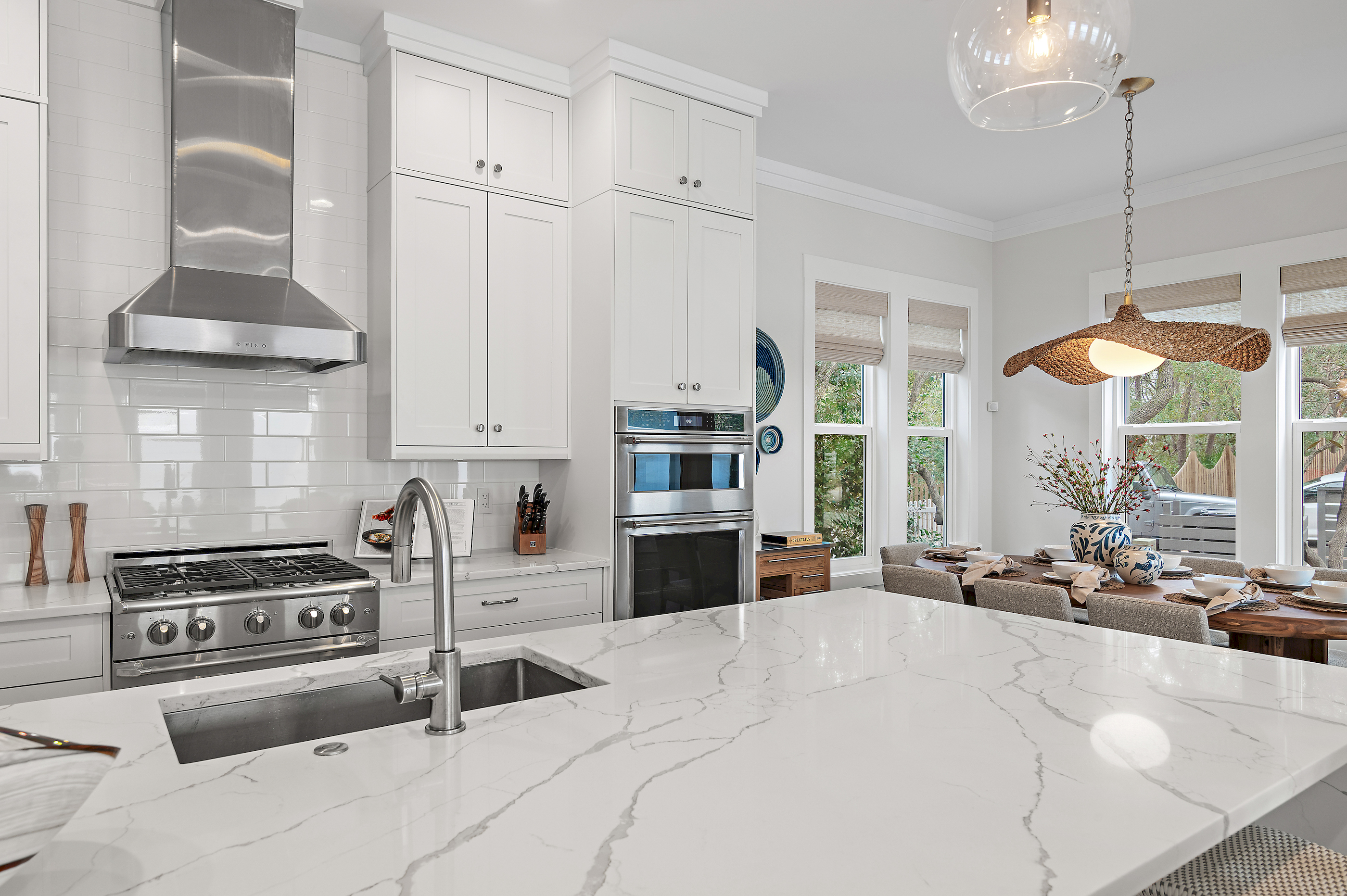 Chef's kitchen is fully stocked with pots, pans, baking dishes, and all of the cooking utensils you might need to prepare meals.