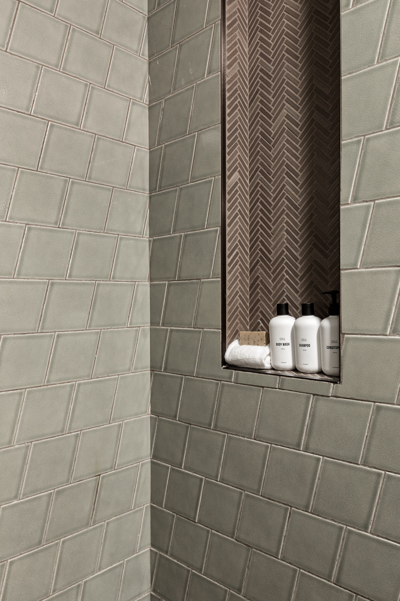 Thoughtfully designed shower niche with custom tilework—stylish, functional details that elevate the space.