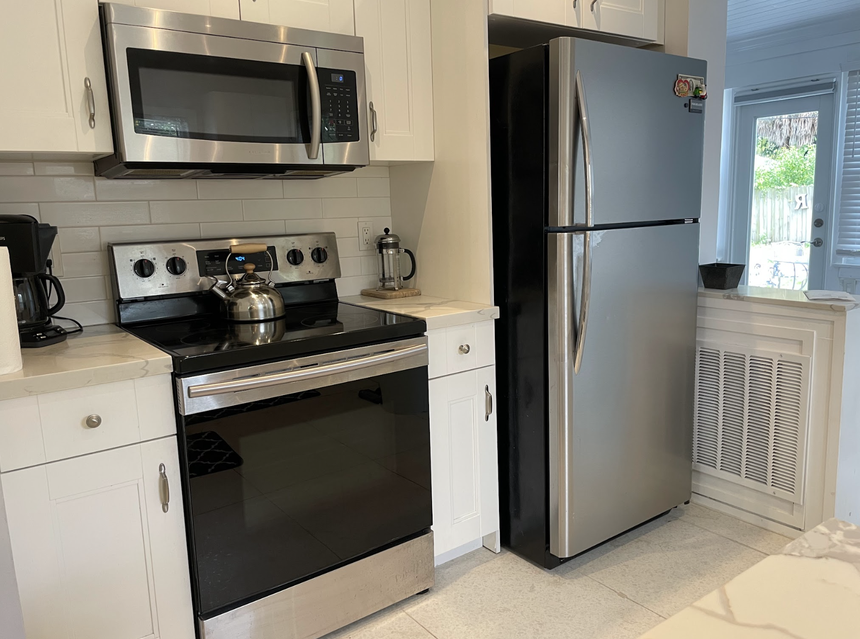 The modern, updated kitchen has all the essentials to make your meals for everyone to enjoy.