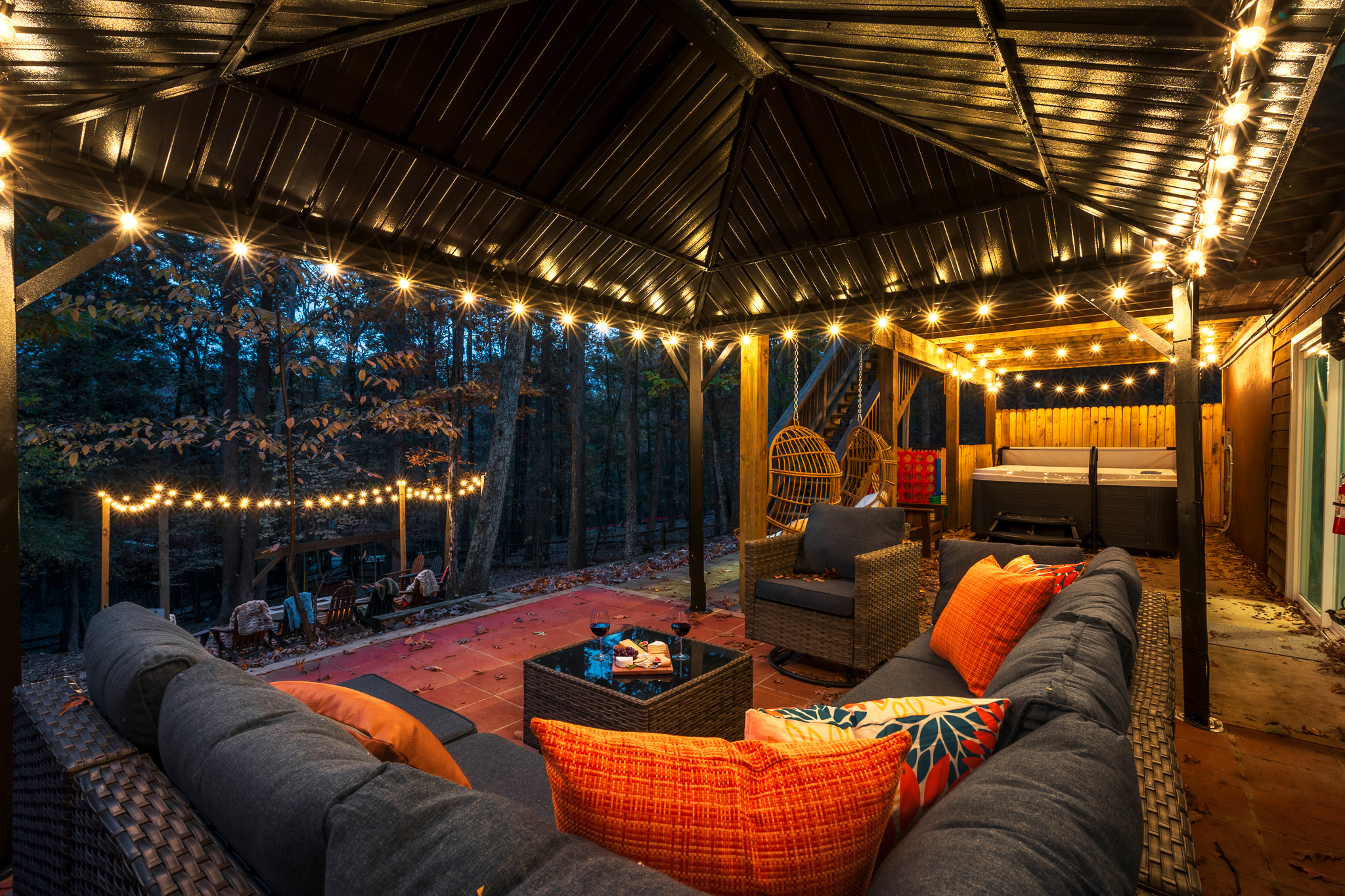 Gather in the shade—this cozy outdoor lounge is the perfect spot for morning coffee or evening chats.