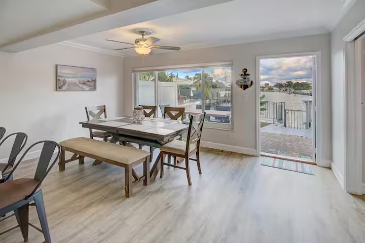 A bright dining room leading out to your private balcony. 