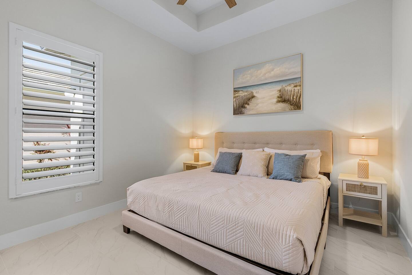 4th guest bedroom featuring a luxurious king-size bed, perfect for restful nights and sweet dreams!