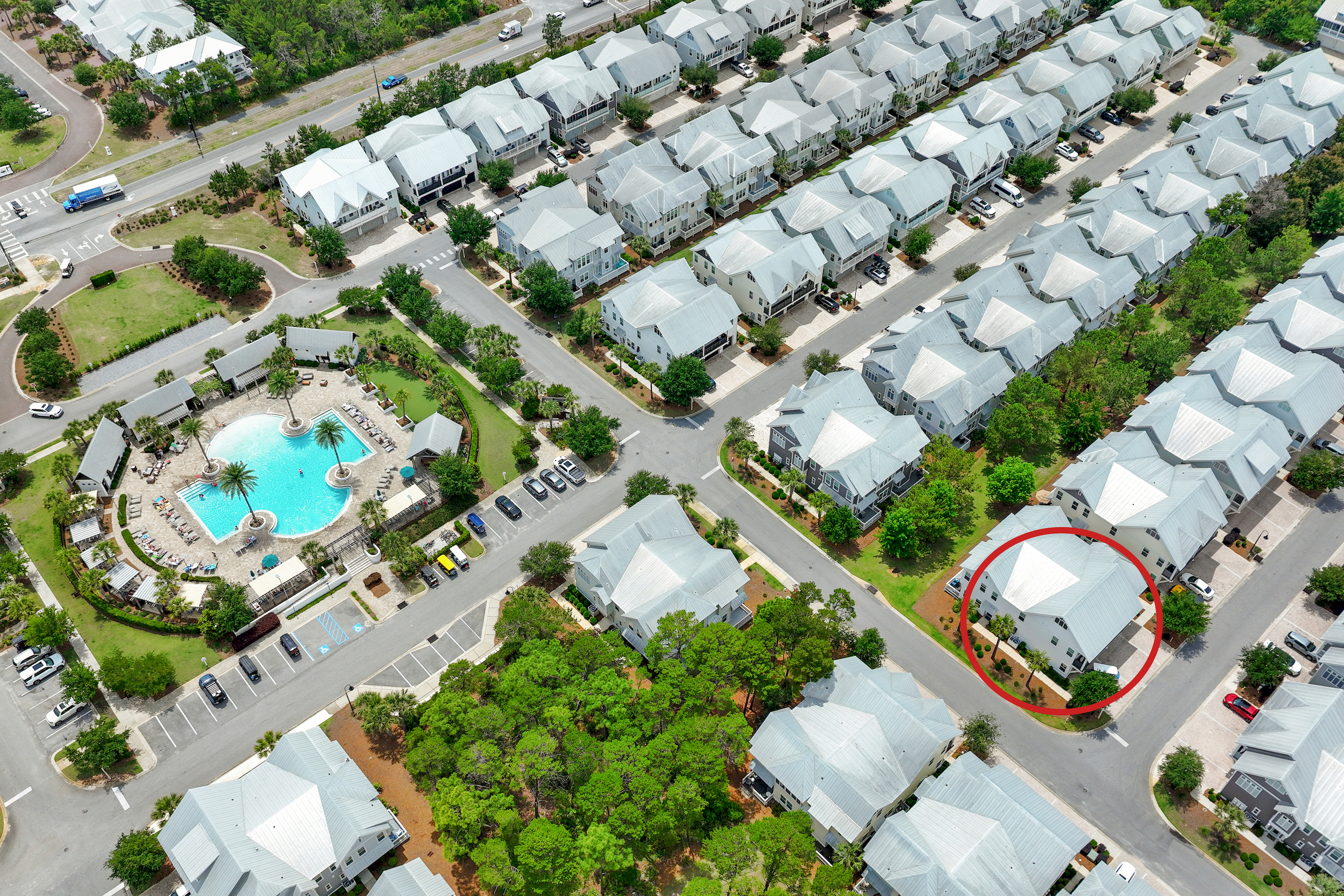 Capture the convenience of our location with this photo, showcasing how close the home is to the resort-style pool area.