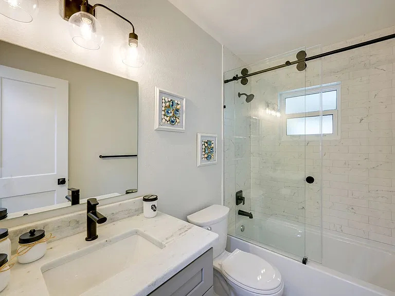 Bathroom with tub and shower
