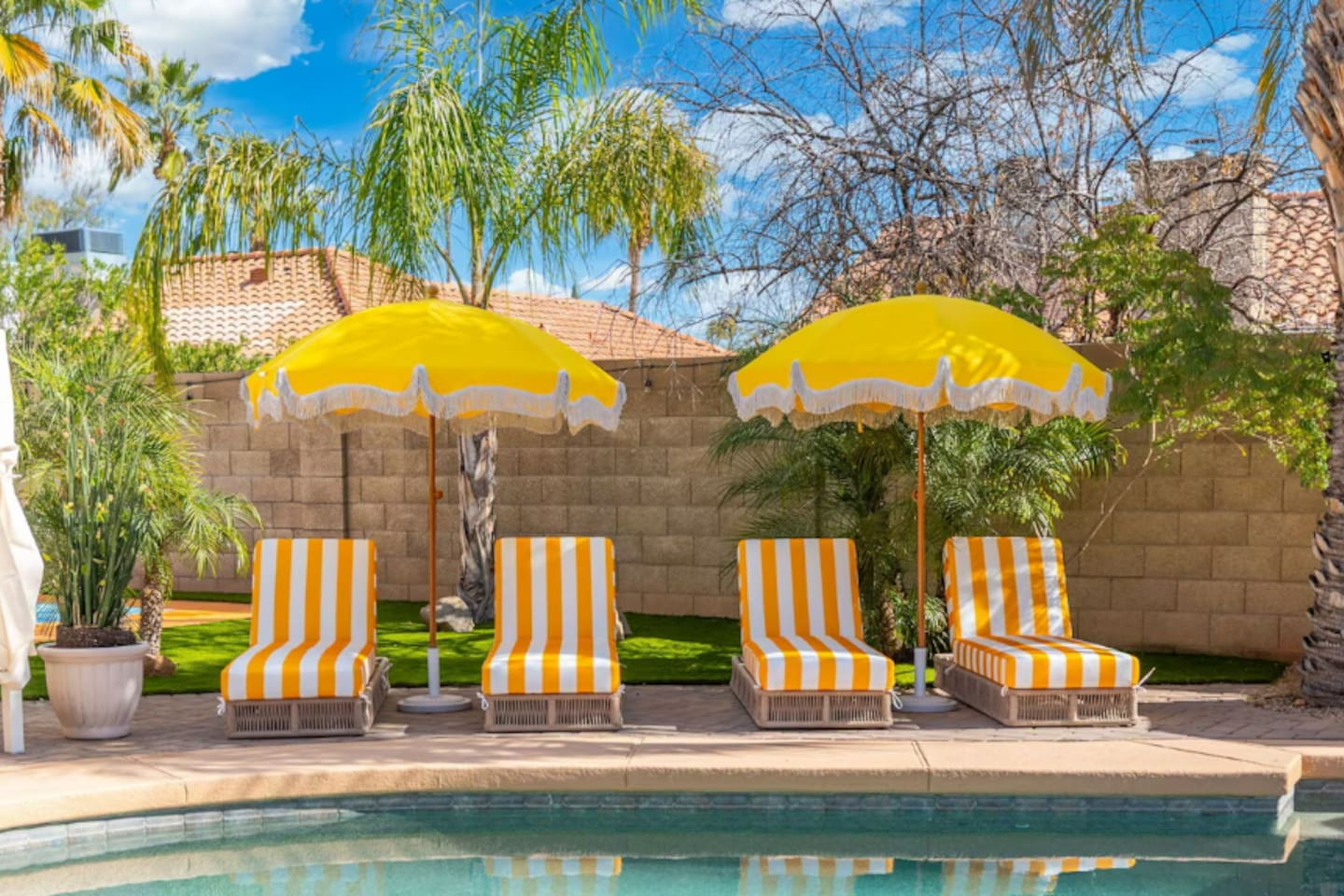 Enjoy the heat without getting sunburnt on these comfy loungers under umbrellas.