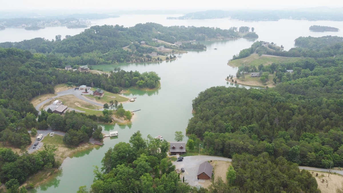 The cabin is in the center of the bottom of the picture where you can see it on the property.  The rest of the picture shows the cove out to the center of the very large Douglas Lake. 