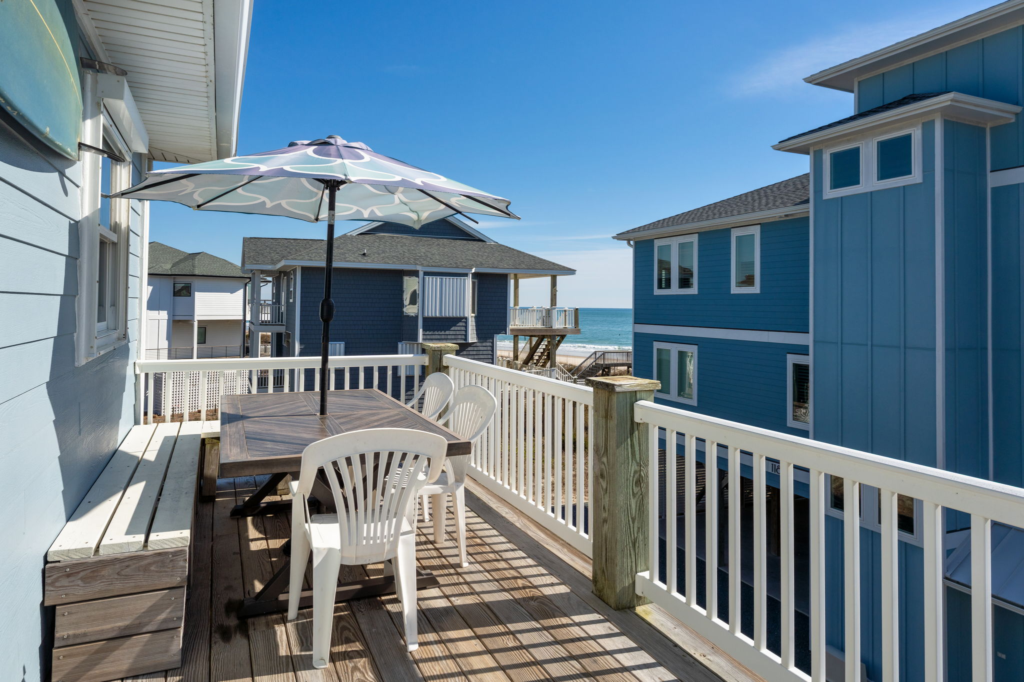 Back Deck - 3rd Floor with Table, Chairs & Umbrella