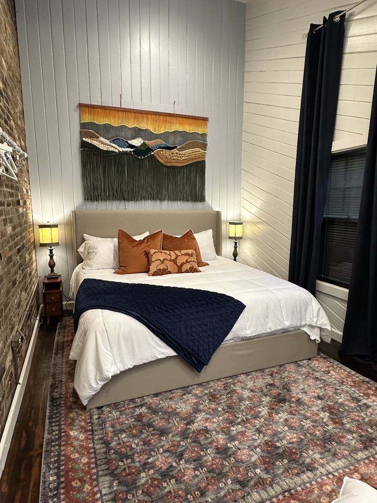 The Boho Room. Original exposed brick and hardwood floors.