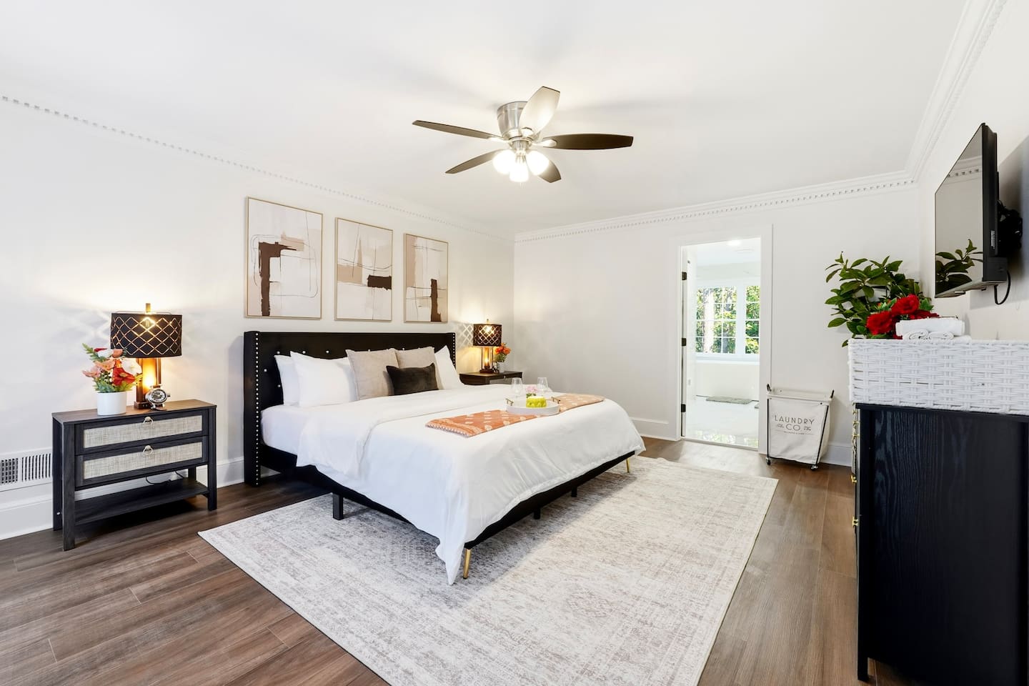 Spacious main-level master bedroom featuring a king bed, a Roku-powered Smart TV, and conveniently located to the left as you enter the home. This room includes 2 full-body towels, 2 washcloths, and 2 hand towels for your stay.