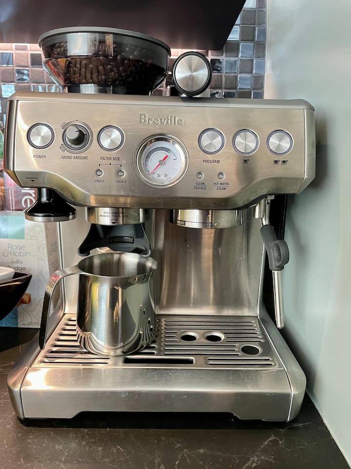 Espresso machine w/ built in grinder is to make sure you get your coffee fix.  We also provide a 10 cup drip coffee maker, a french press,  a Nespresso machine (origin capsule size) and a stand alone coffee bean grinder.