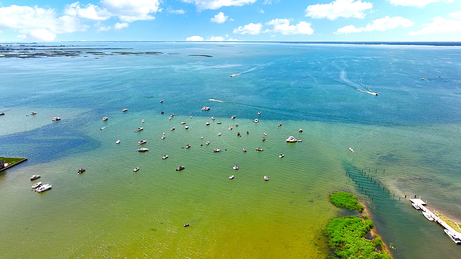 Discover one of Lake St. Clair's favorite gathering spots, where boaters drop anchor, enjoy the shallow waters, and spend unforgettable summer days on the lake.