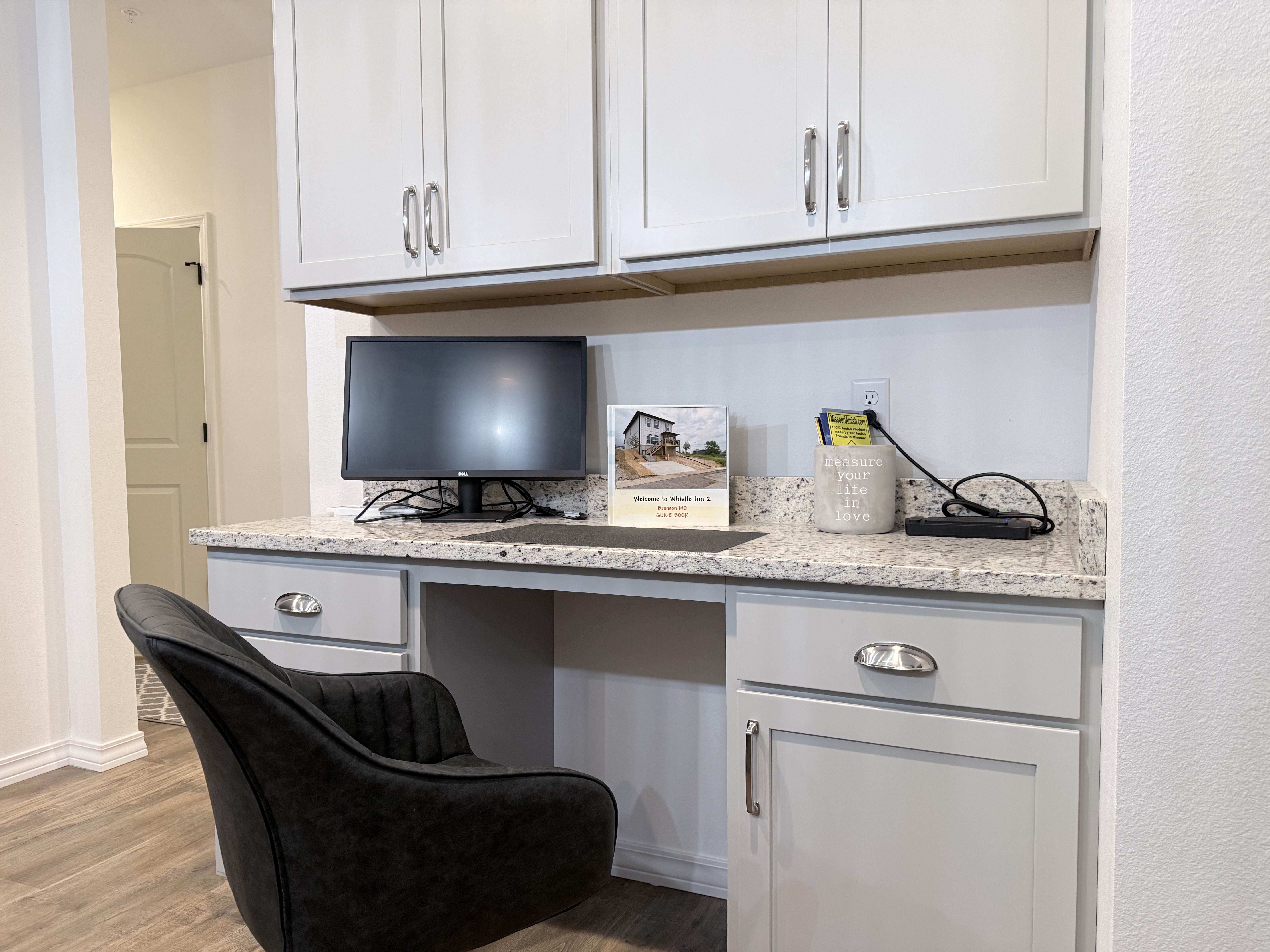work space for catching u on emails. Monitor available if needed. Surge strip on counter.