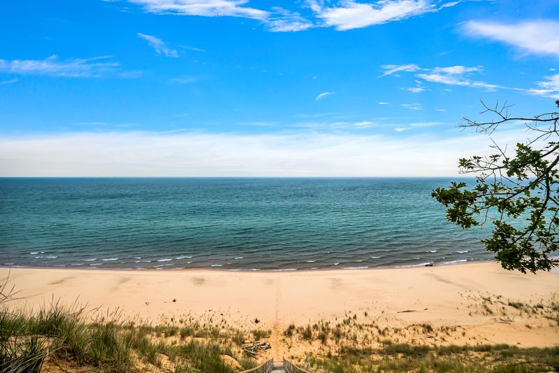 Relax along 372 ft of Lake Michigan beachfront and soak in the beautiful sunsets