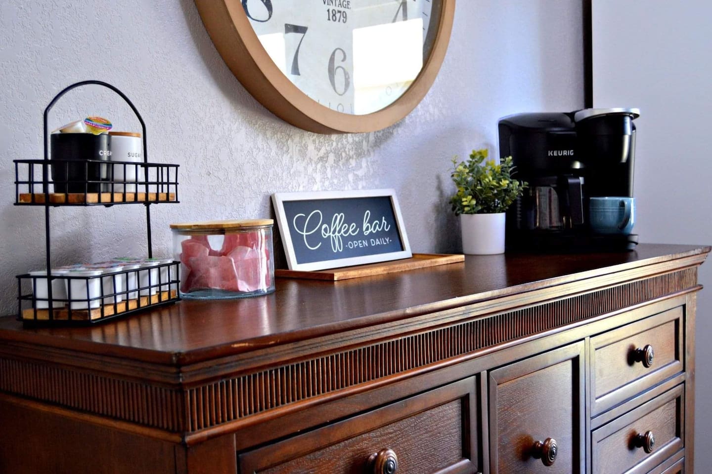 Coffee bar with drip coffee and k-cup Keurig.  Starter supply of coffee, cream, and sugar.