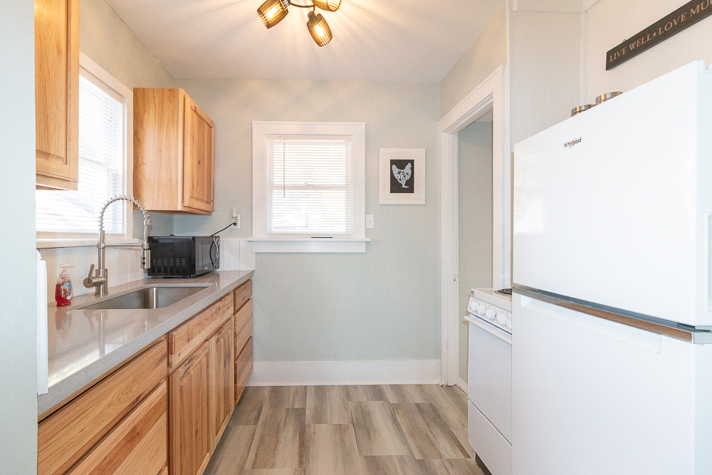 Prepare your favorite meals in the functional kitchen designed for comfort and convenience.