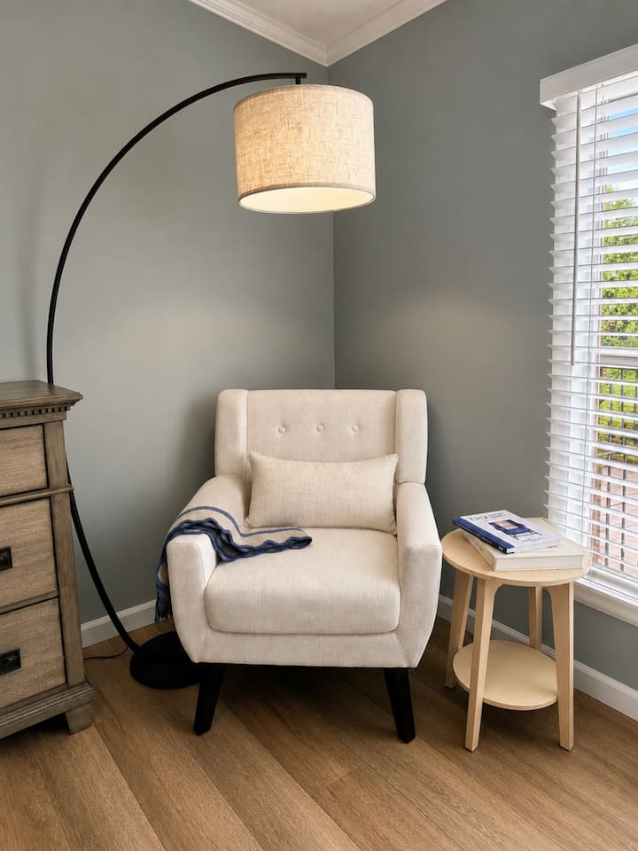 Curl up with a good book, enjoy your morning coffee, or unwind in this cozy reading nook beside the window—a quiet spot all your own inside the king suite.