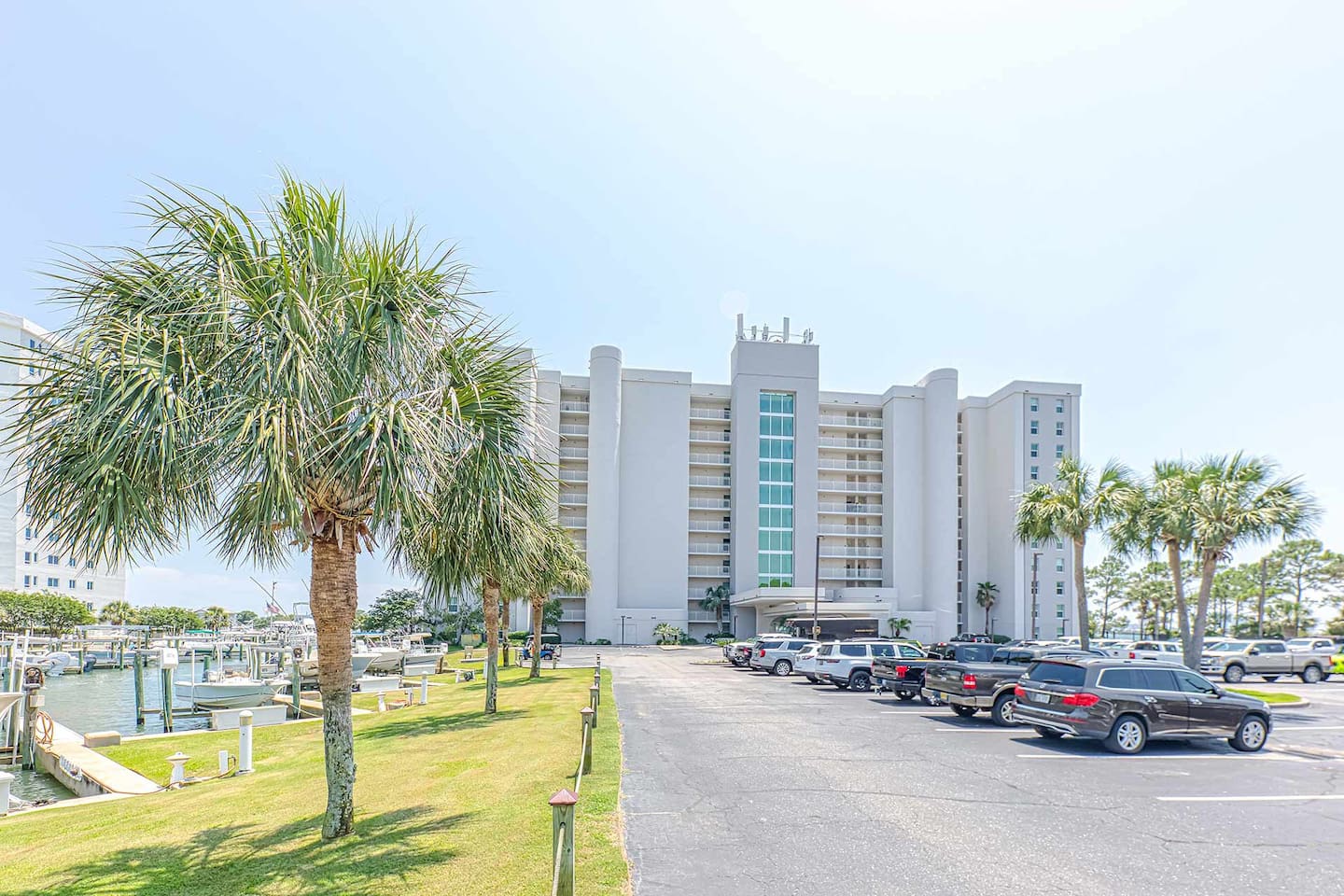 Exterior: Step into paradise with palm-fringed views and vibrant marina vibes!