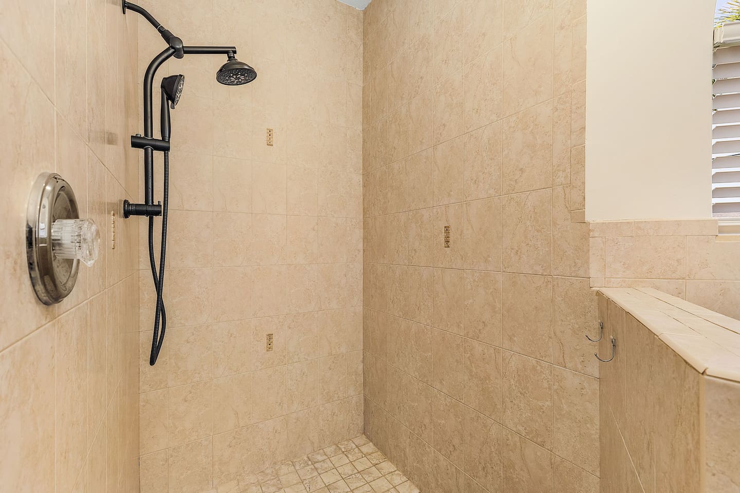 Primary ensuite bathroom featuring a shower.