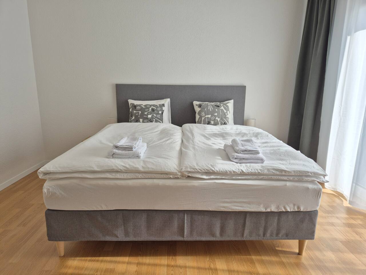 The king sized box spring bed with memory foam topper