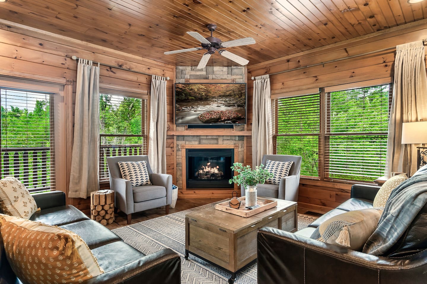 The living room, a beautiful space to play games, watch a movie & chill | Opens to the mid-level porch