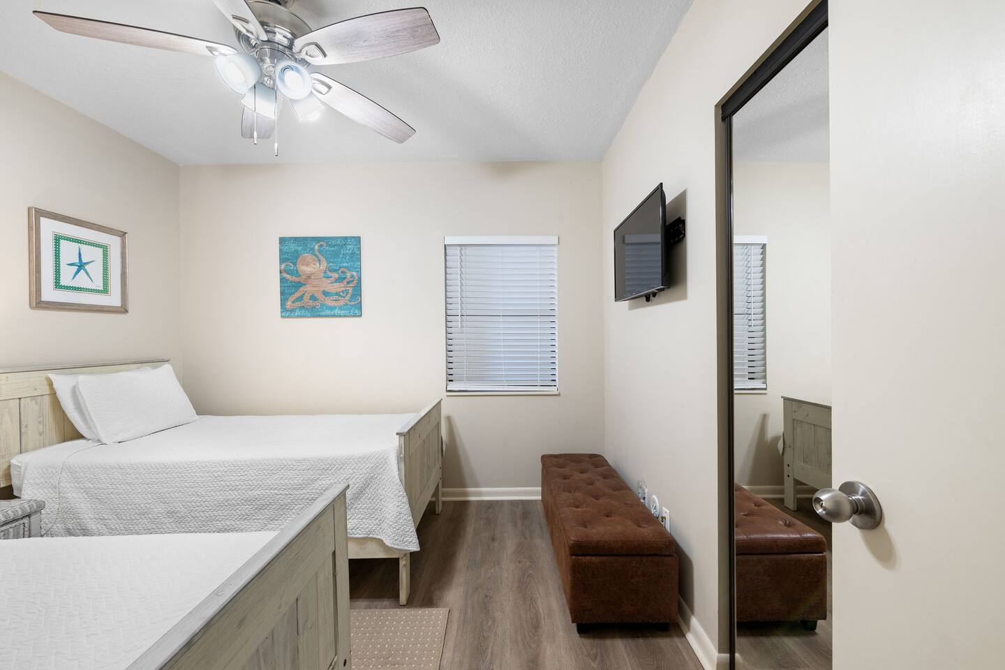 Another view of the kids room, with plenty of closet space and dedicated TV.