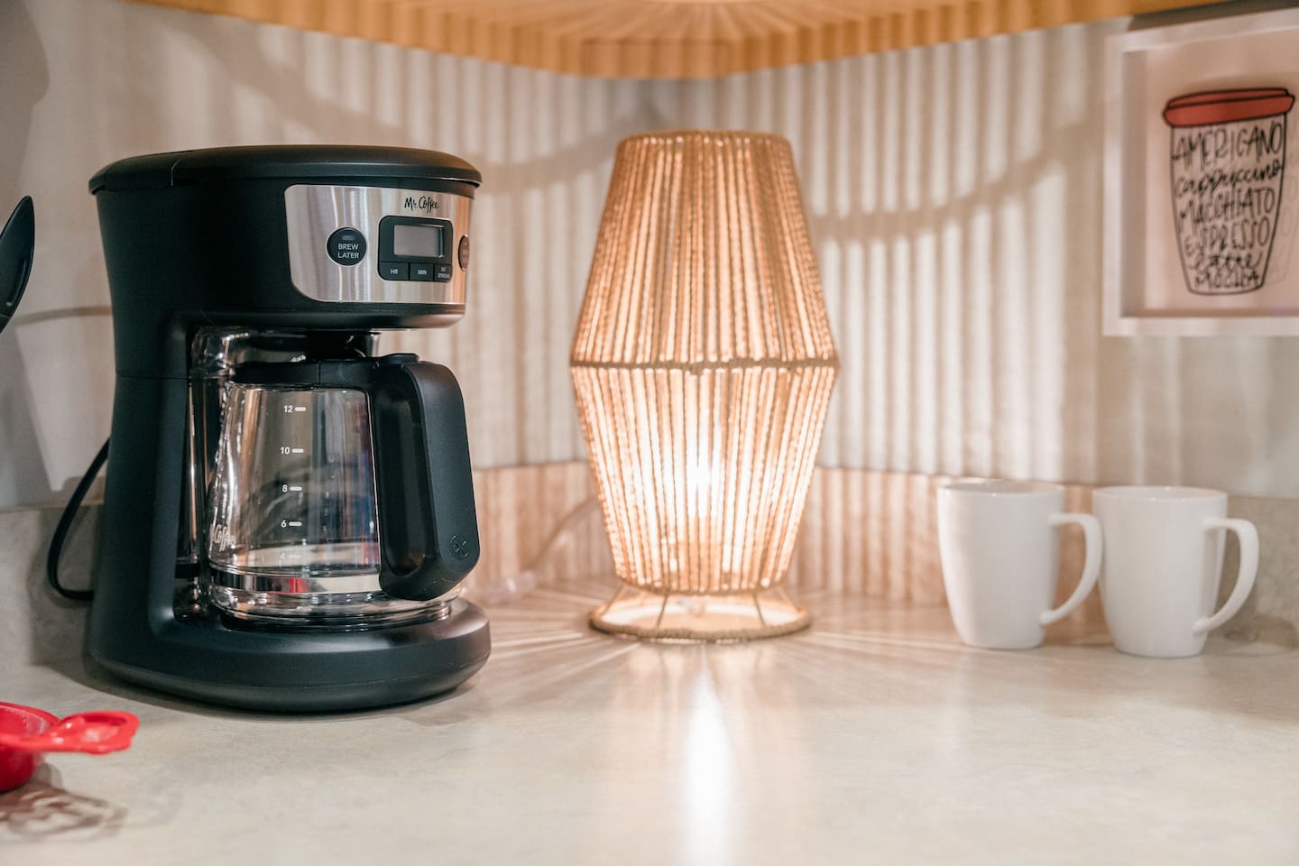 Mr. Coffee 12 cup drip coffee maker. Grinder available for fresh beans. Coffee and tea provided.