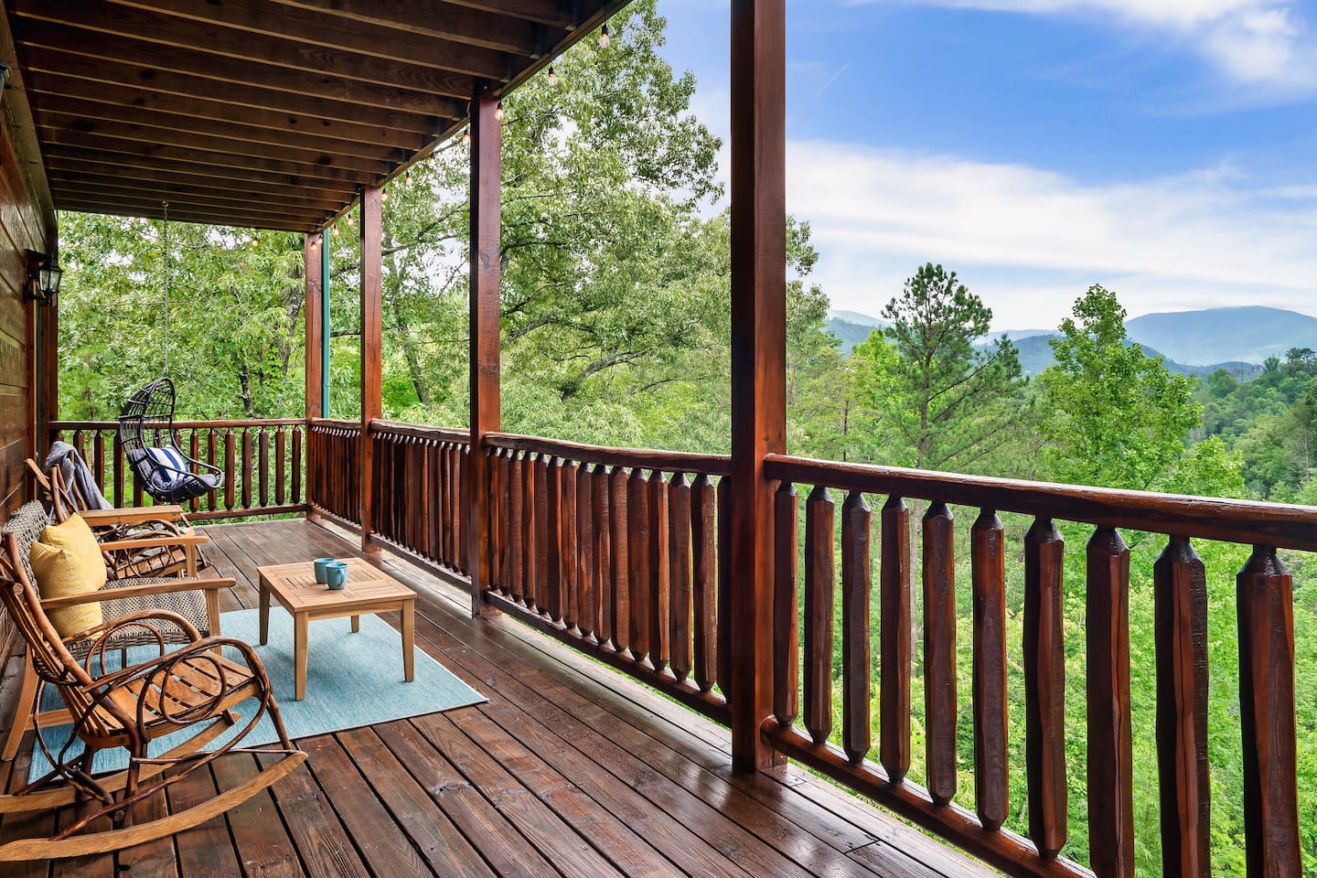 Porch located off the main living room. There's no better place to lounge than overlooking the mountains.