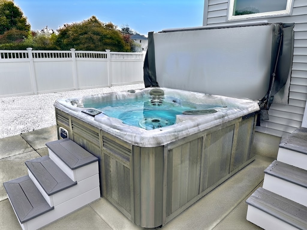 Dive into pure bliss in our premium hot tub, perfectly situated for a soak after a long day of beach adventures. This private, fenced-in backyard feature ensures your vacation is as relaxing as it is memorable.