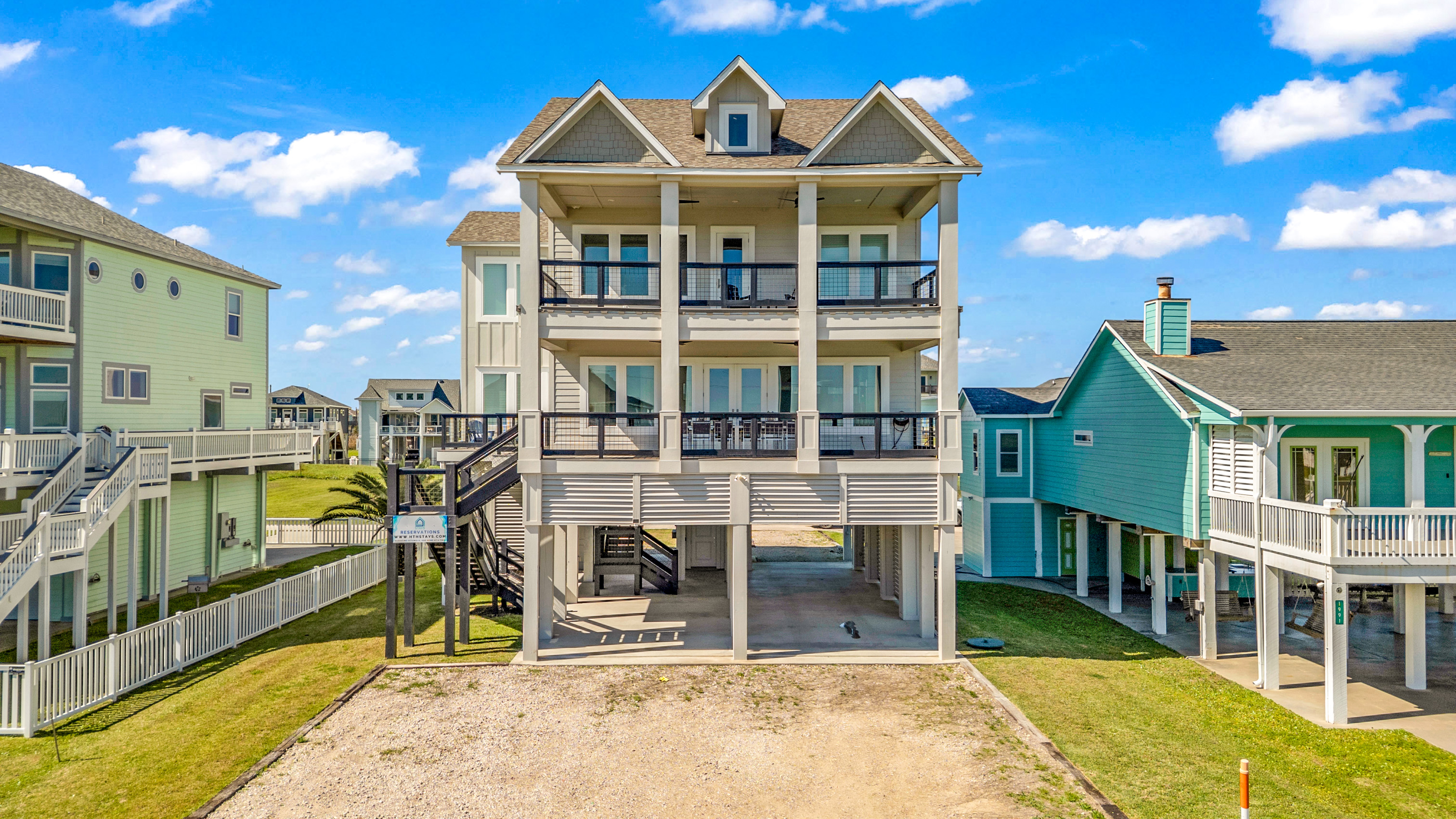 Costa Cristal Exterior: This house commands attention with its sleek facades, large windows, and grand entrances, reflecting modern elegance at every angle.