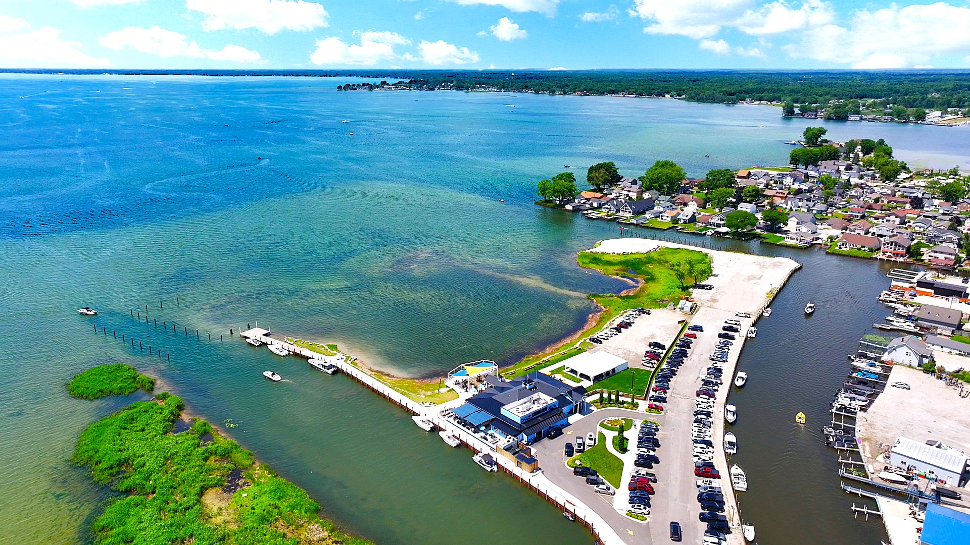 Enjoy the best of Lake St. Clair just outside your door—from the sandy swimming area to Cabana Blue Lakefront Sports Bar & Grill, where waterfront dining, refreshing drinks, and live entertainment are all within a short stroll.