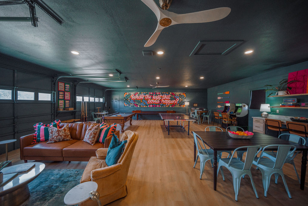 Game Room with 12' Shuffle Board, pool table, arcade games and more! 