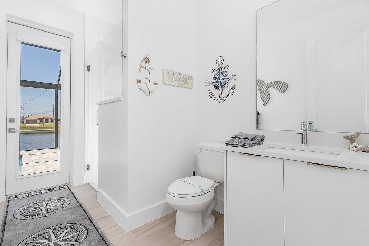 1st Guest bathroom featuring a shower and direct access to the pool area!