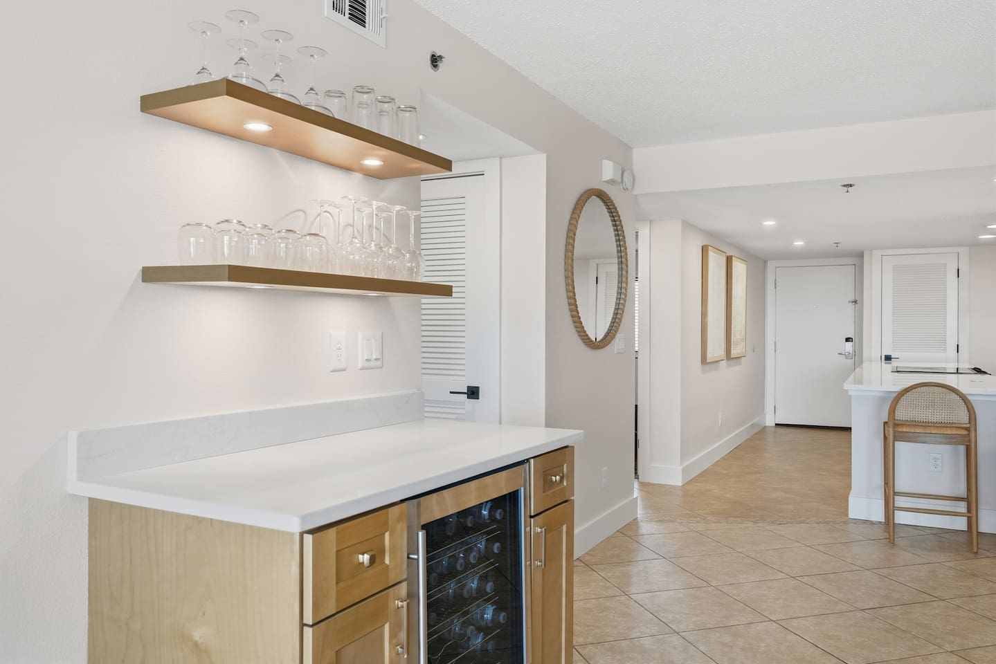 Dry bar includes beverage center to store additional drinks