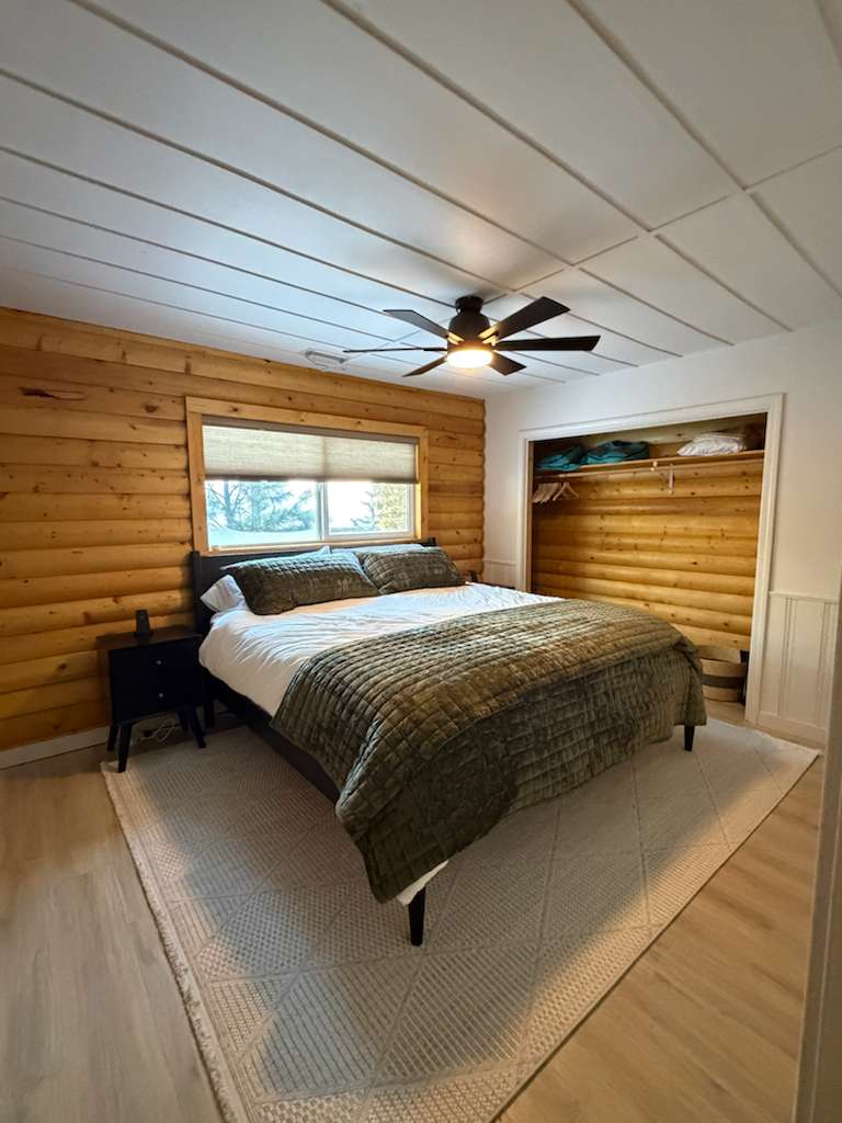 Bright and cozy bedroom with a king bed, perfect for couples or guests looking for extra comfort and space.