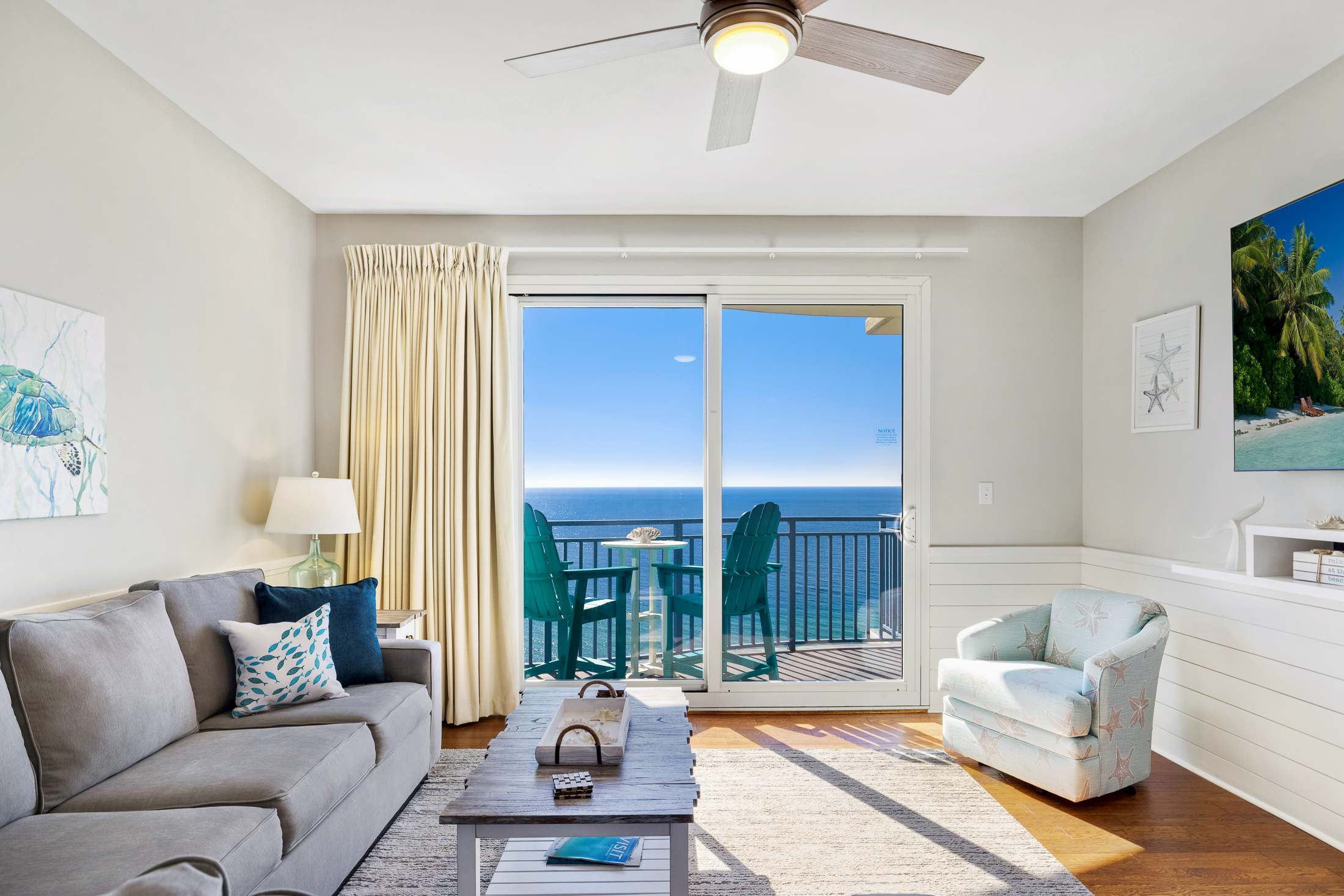 Floor to ceiling sliding glass door provides unparalleled views of the ocean from your living room.