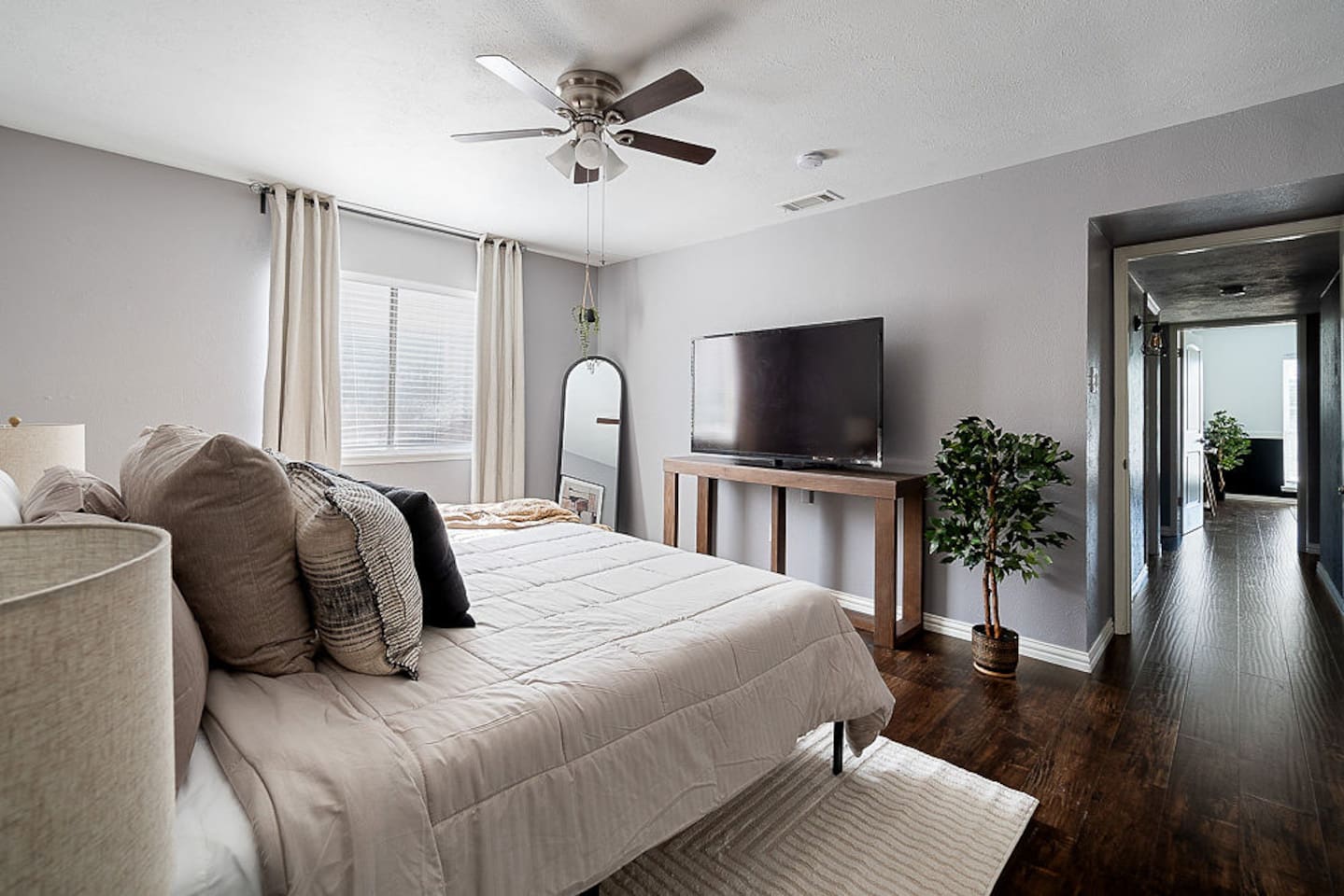Find refreshment in the master bedroom with a king-sized bed and a private, attached bathroom for your ultimate comfort