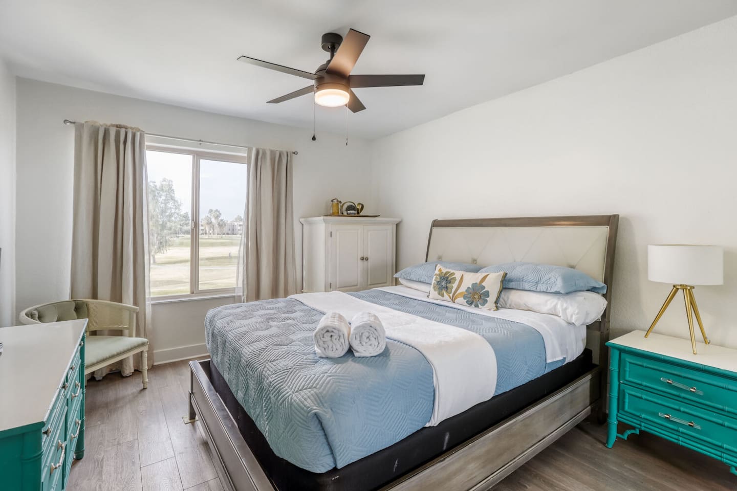 Rolling green fairways stretch toward the horizon, setting a peaceful backdrop for your stay.