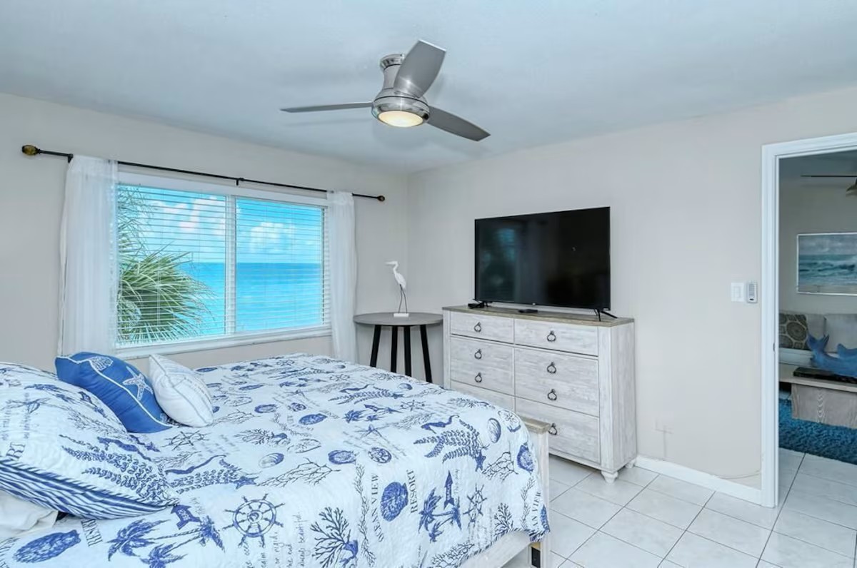 King master bedroom with Gulf view and TV