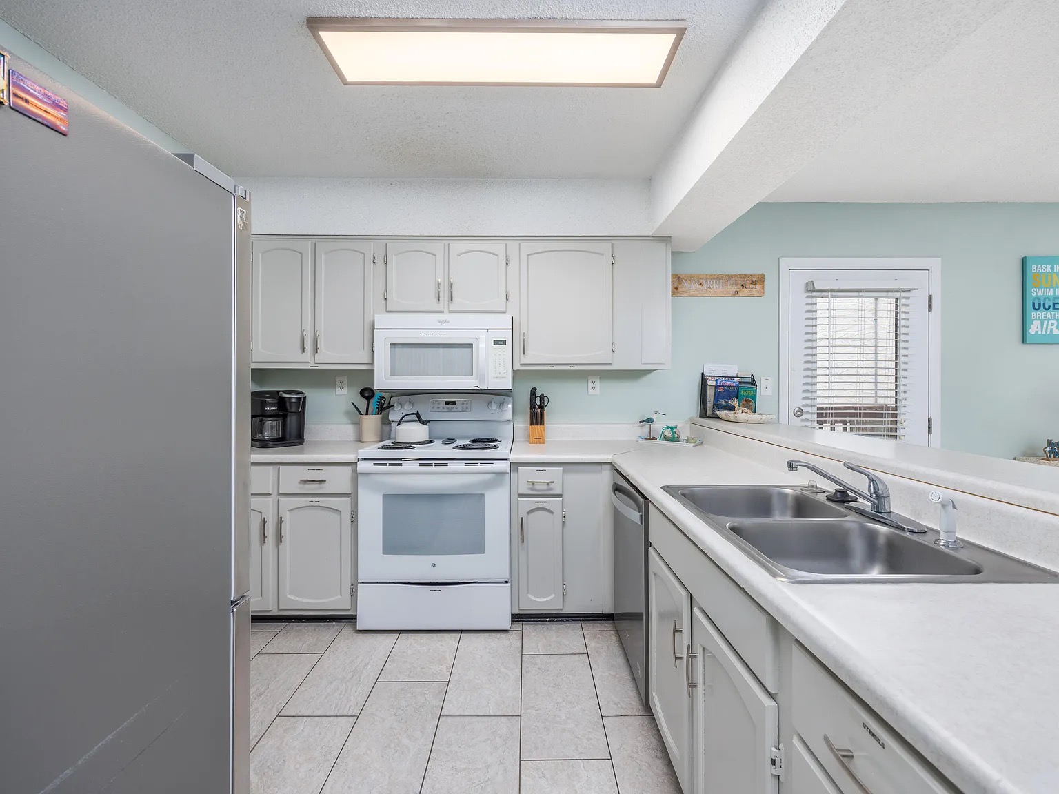 Full kitchen is fully stocked with everything you need