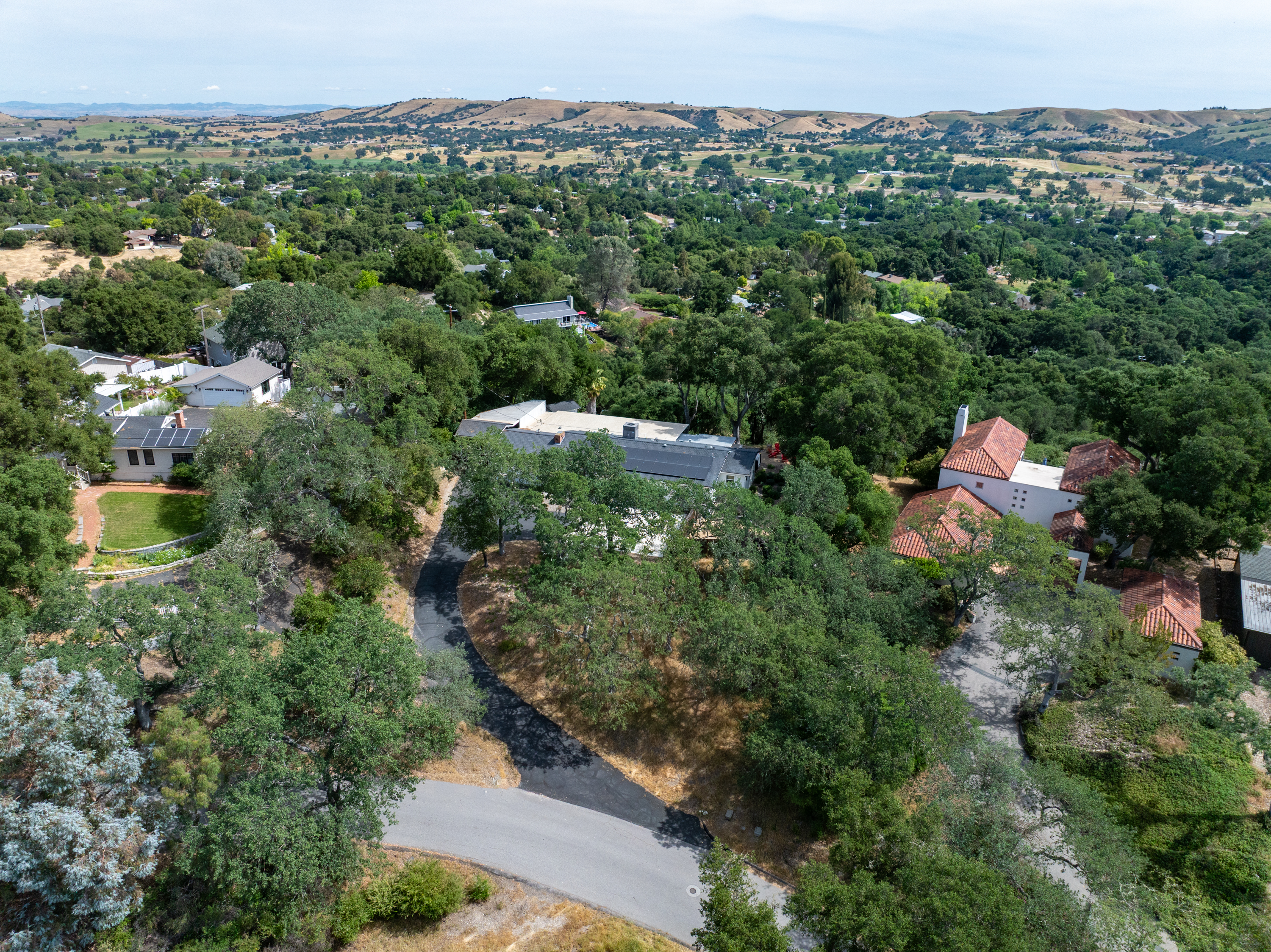 A peaceful escape surrounded by rolling hills and lush greenery.