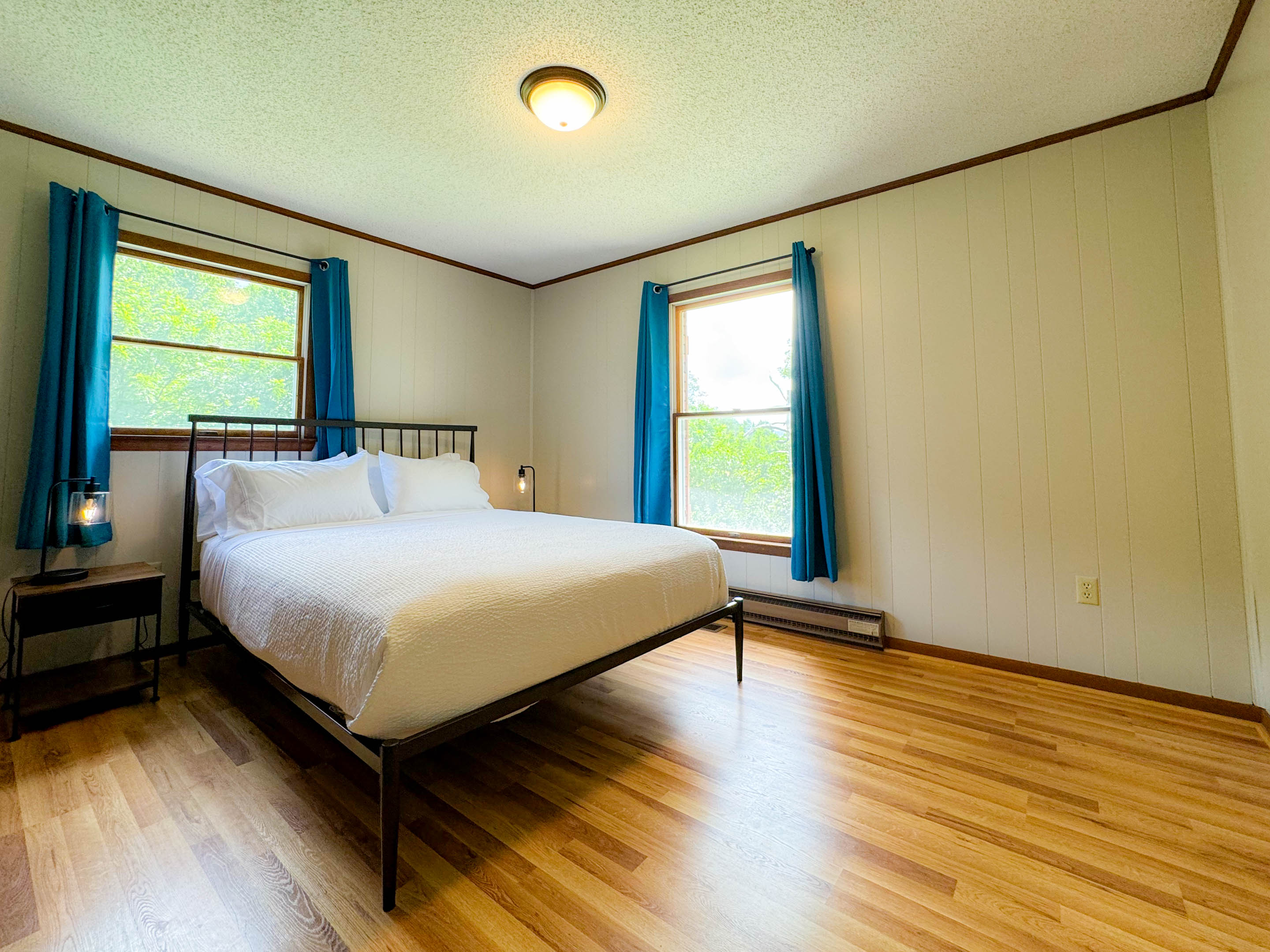 The second guest bedroom features a queen sized bed with high thread count linens and pillows. This room is very spacious as well with some closet storage as well!