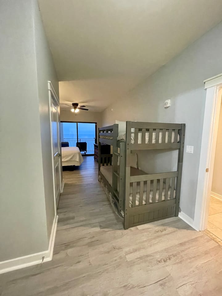 East Master bedroom bunk bed with trundle sleeps 3 kids