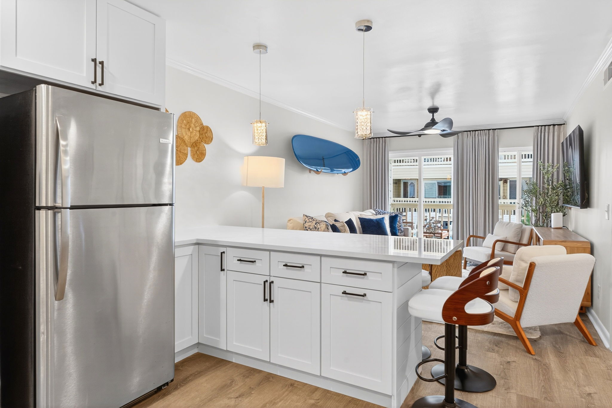 Dining & Living Room | Beach Break | IOP Escapes Vacation Rentals | 1400 Ocean Blvd 106B, Isle of Palms SC