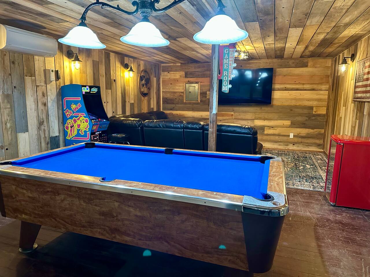 Pool table, arcade game, 75 inch TV
