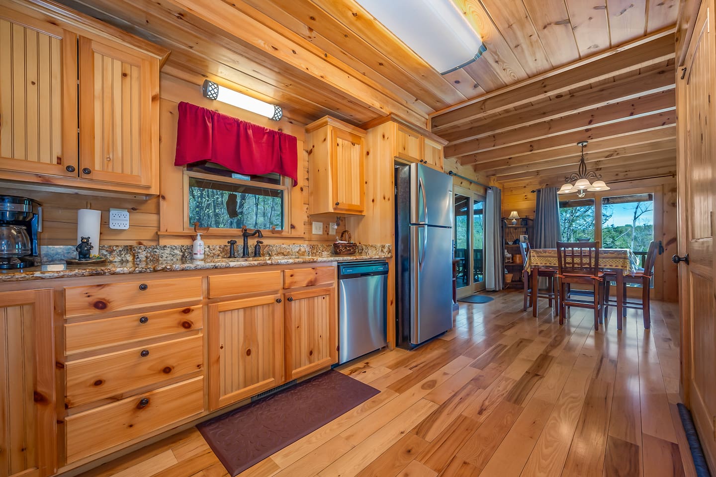 Full size kitchen with  garbage disposal, refrig with ice maker and dishwasher